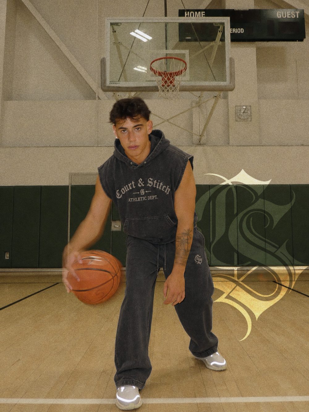 Court & Stitch hoodie and sweatpants on a basketball court